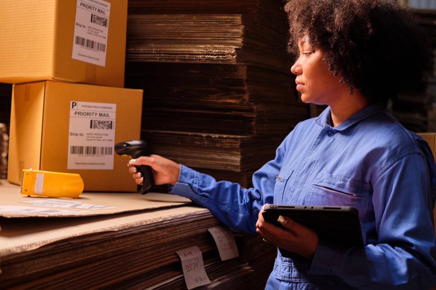Sierra Post Box staff handling parcels in warehouse
